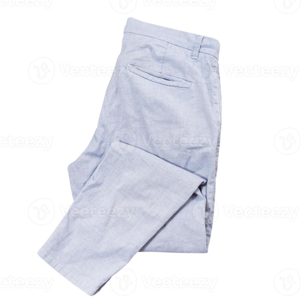 pantalon bleu clair isolé sur fond blanc, vue de dessus de pantalon plié, élément de tissu de mode flatlay photo