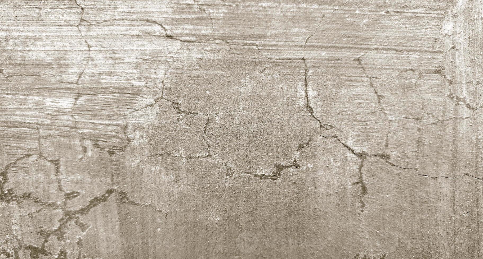 texture de ciment fissuré gris pour le fond photo