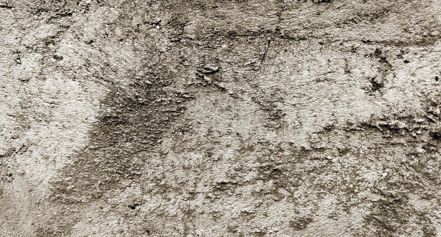 texture de ciment fissuré gris pour le fond. rayures murales photo