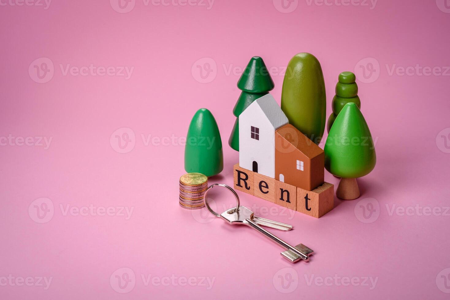 petit en bois maison et le une inscription pour louer. concept pour vente, de location de réel biens pour une famille photo