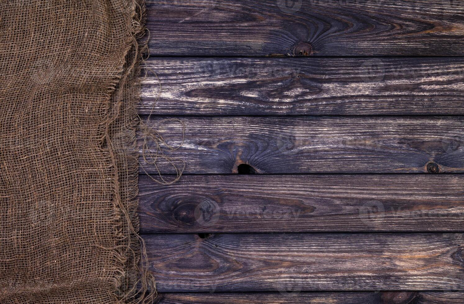 foncé en bois texture avec toile de jute, rustique bois et sac photo