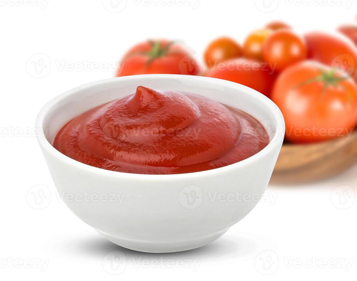 ketchup dans bol sur blanc Contexte photo