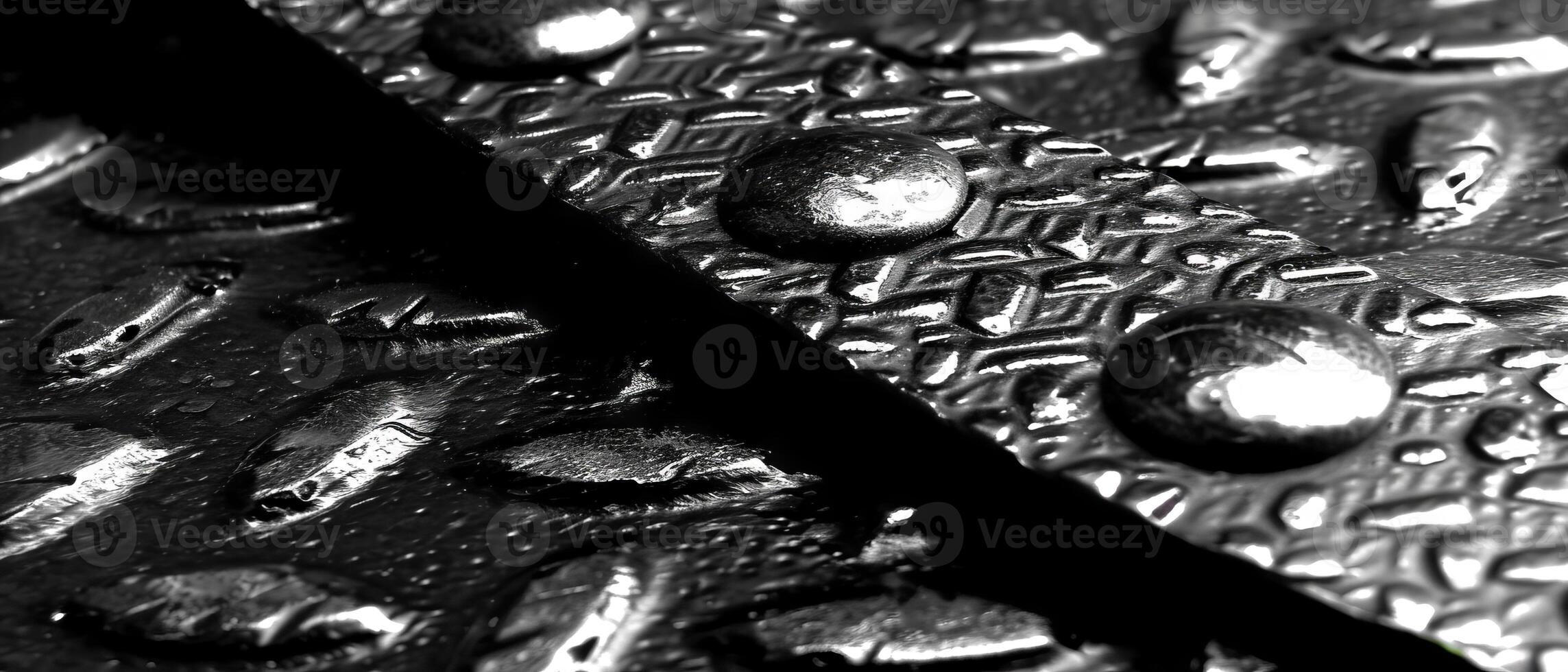 ai généré macro coup de brillant l'eau gouttelettes sur une texturé noir perforé métal surface photo