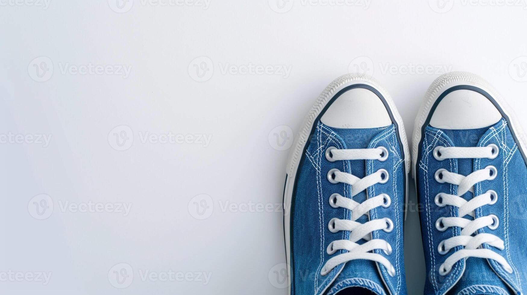 ai généré bleu Toile des chaussures isolé sur plat blanc Contexte avec copie espace pour publicité. génératif ai photo