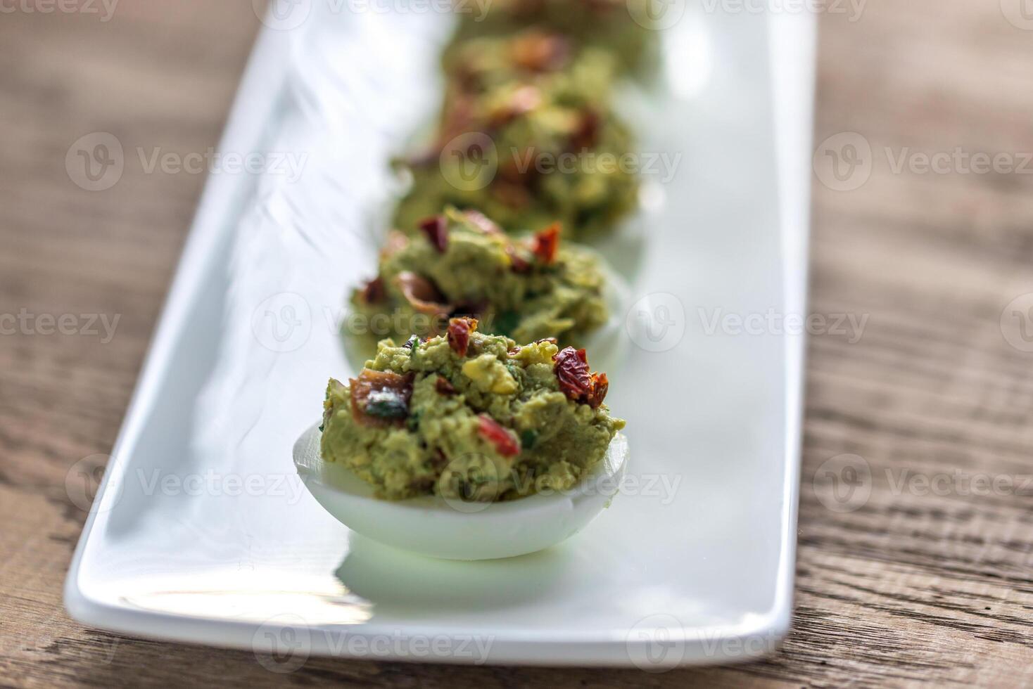 Bacon guacamole diable des œufs photo