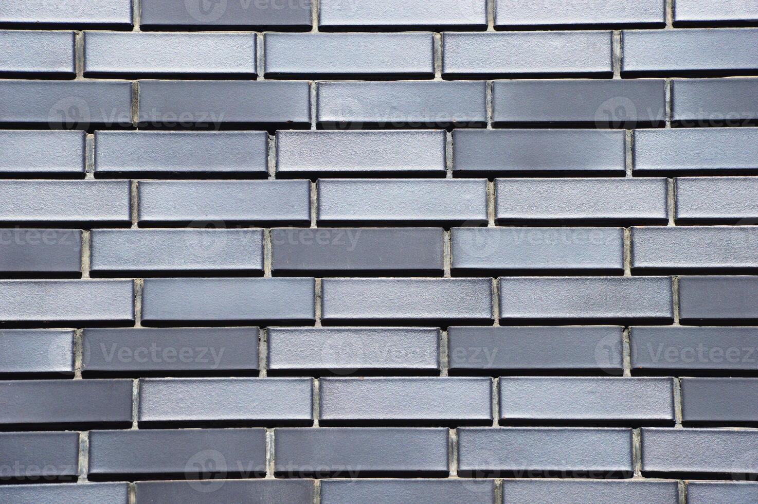 gris brique mur avec magnifique texture. Contexte. photo