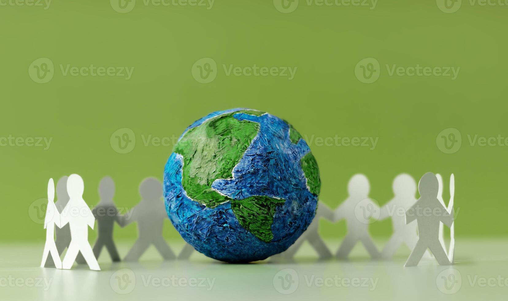 monde Terre journée concept. vert énergie, esg, renouvelable et durable ressources. environnement se soucier. papier Couper comme groupe de gens embrassement une vert globe. protéger planète ensemble. Haut vue photo