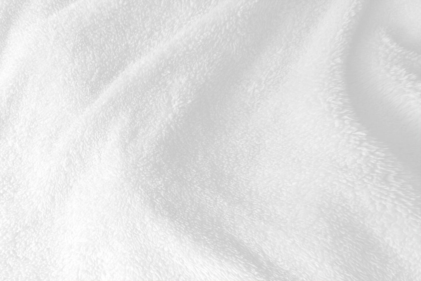 défocalisé de abstrait blanc serviette Contexte avec vagues. photo