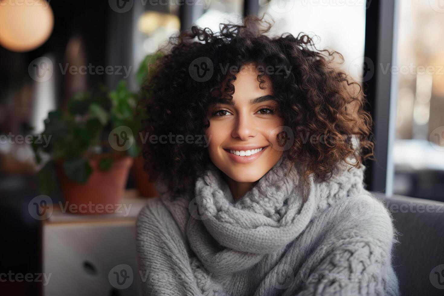 ai généré Accueil confort, positif africain américain Jeune femme dans une chaud confortable tricoté gris chandail dans une confortable vivant pièce à la recherche à caméra sur une hiver journée photo