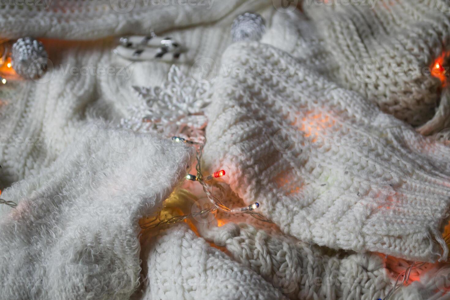 blanc tricoté texture avec décor. doux vêtements. hiver saison. photo