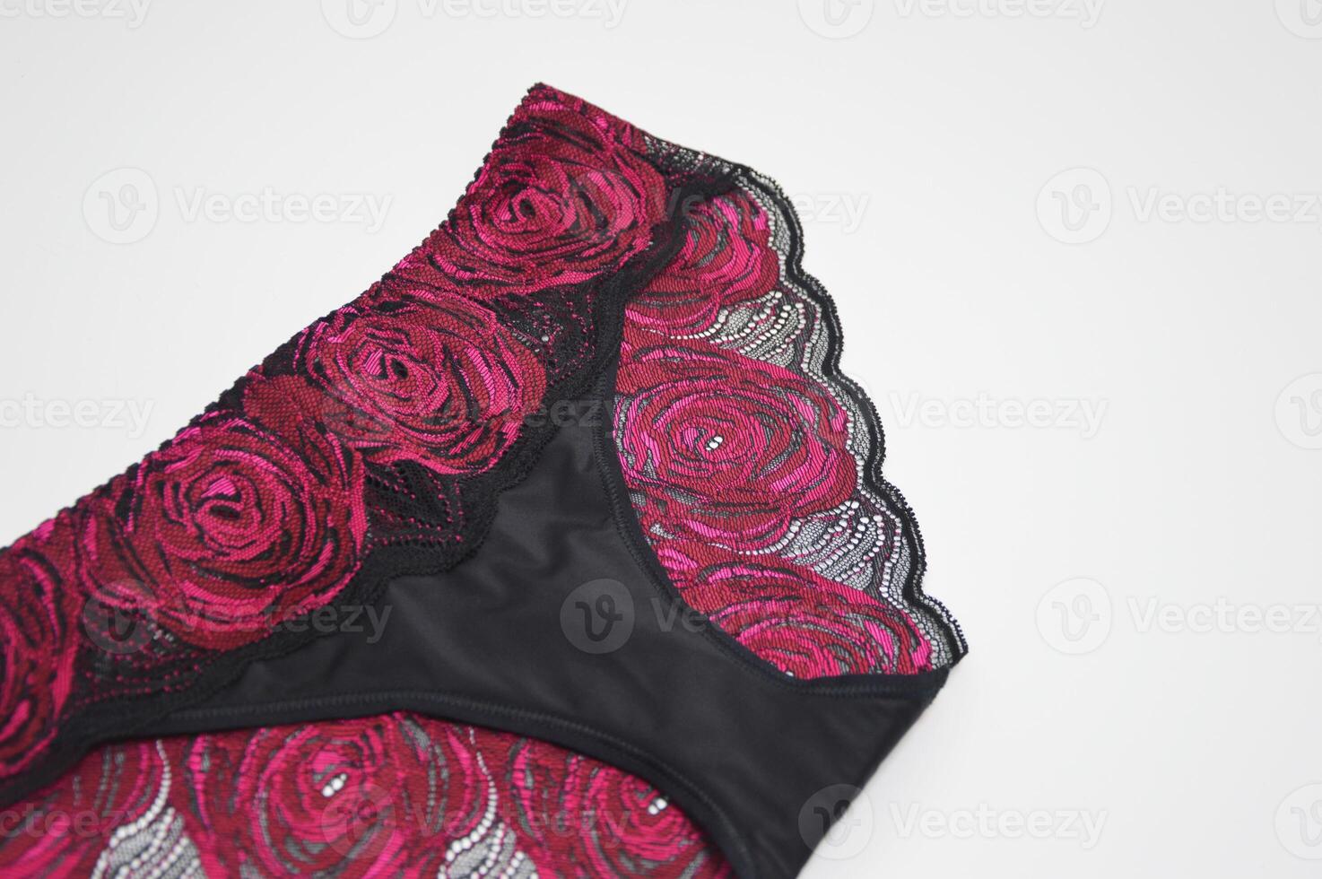 lingerie. noir culotte avec brillant rose dentelle sur une blanc Contexte. à la mode aux femmes sous-vêtements photo