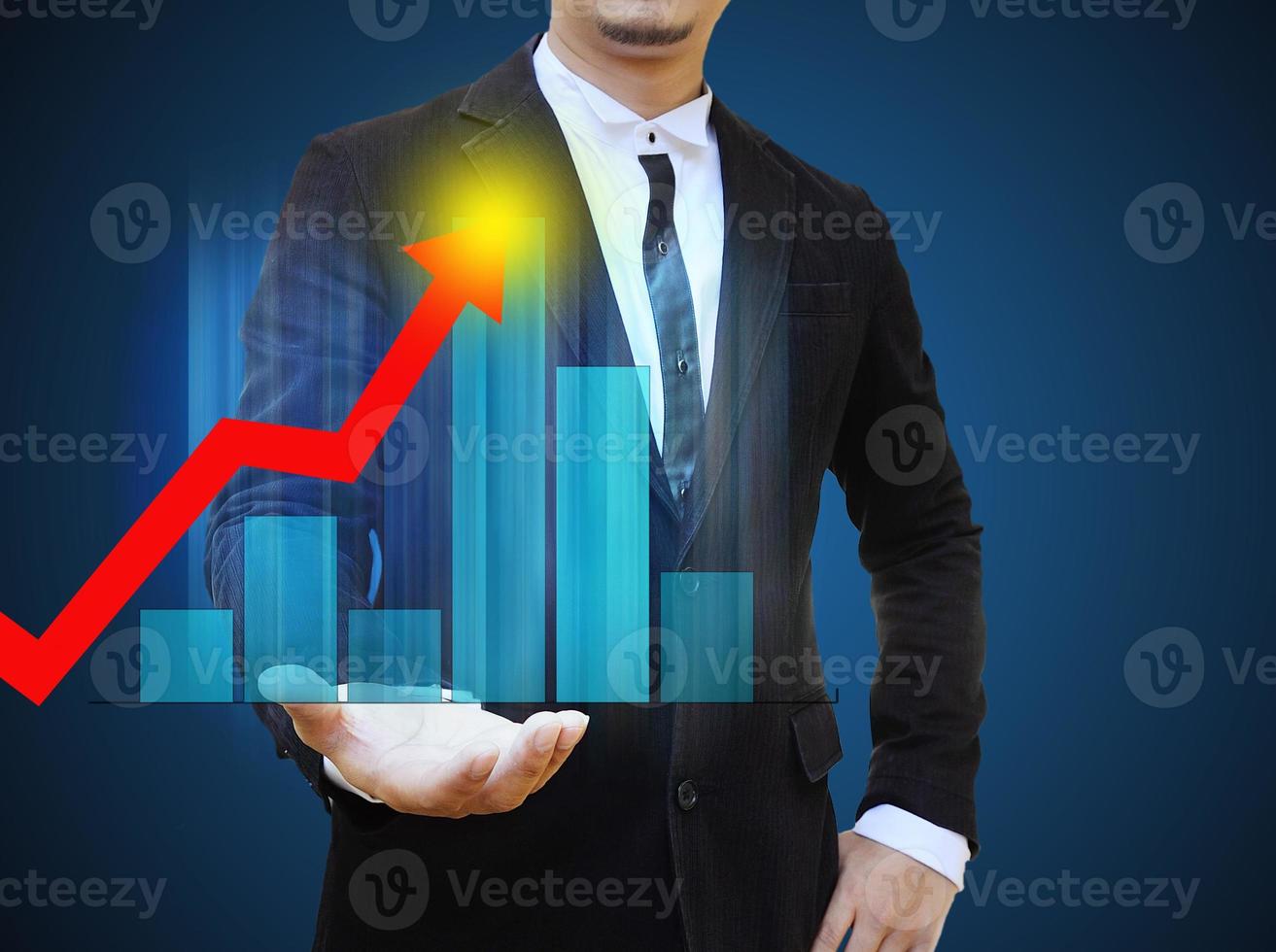 graphiques sur les mains des hommes d'affaires. . concept de croissance de l'entreprise. photo