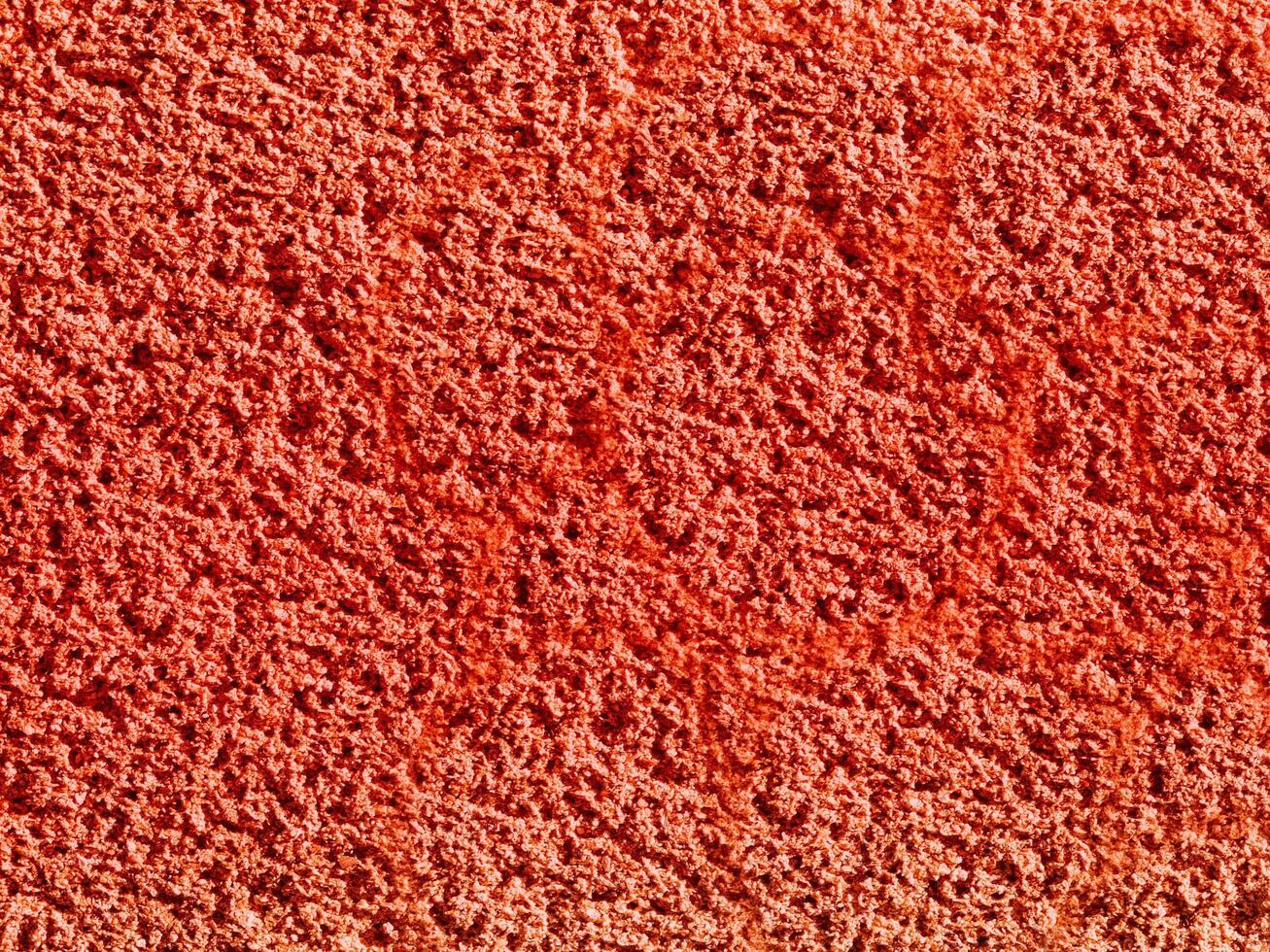 texture de pierre rouge dans le jardin photo