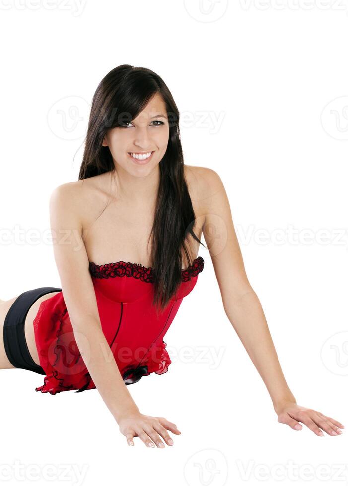 Jeune caucasien femme rouge corset sur sol photo