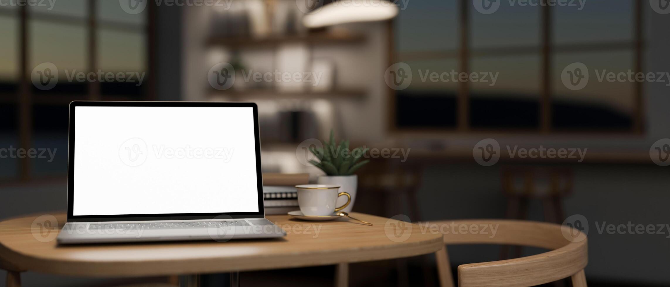 une portable ordinateur maquette sur une en bois table dans une minimaliste confortable café magasin à nuit photo