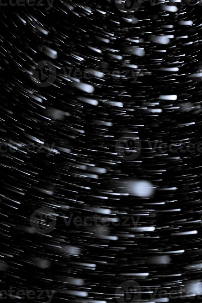 pluie d'astéroïdes sur noir photo