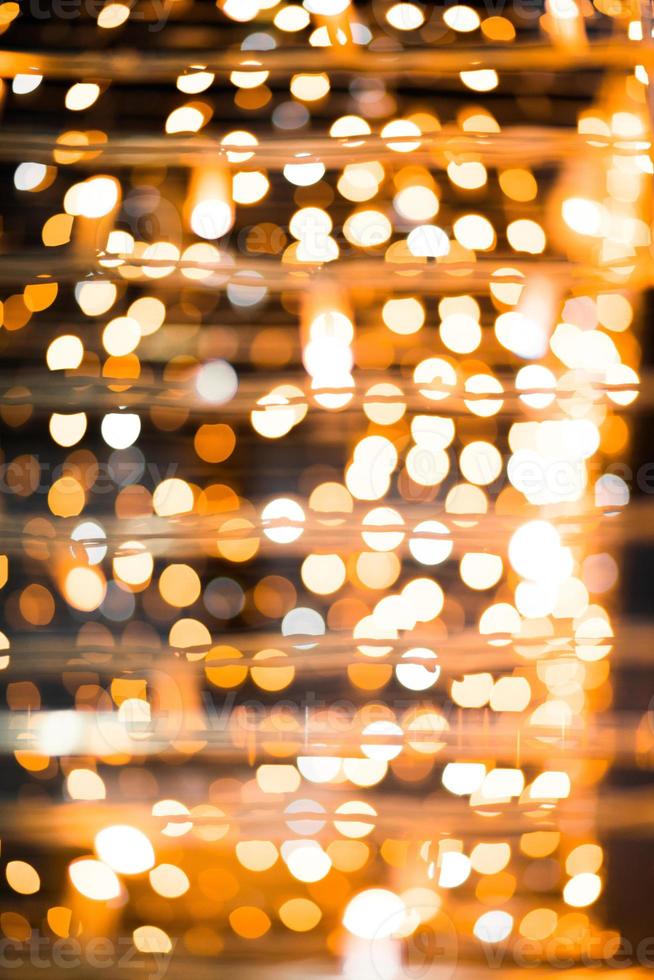Noël floue lumières jaunes dorées bokeh la nuit photo
