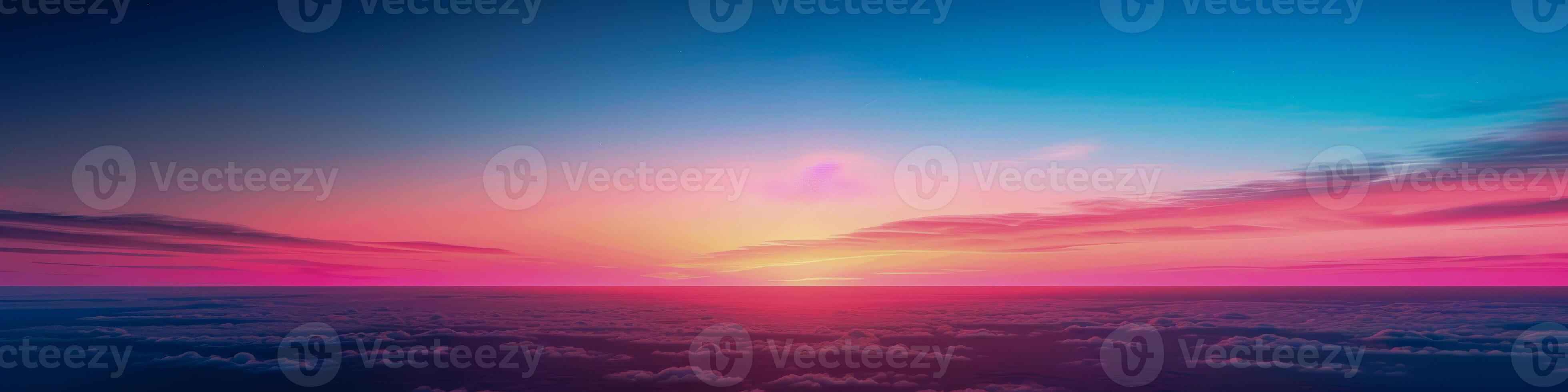 surréaliste le coucher du soleil au dessus le des nuages avec vibrant rose et bleu teintes photo