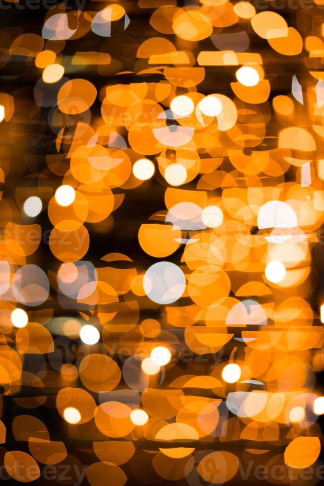 Noël floue lumières jaunes dorées bokeh la nuit photo