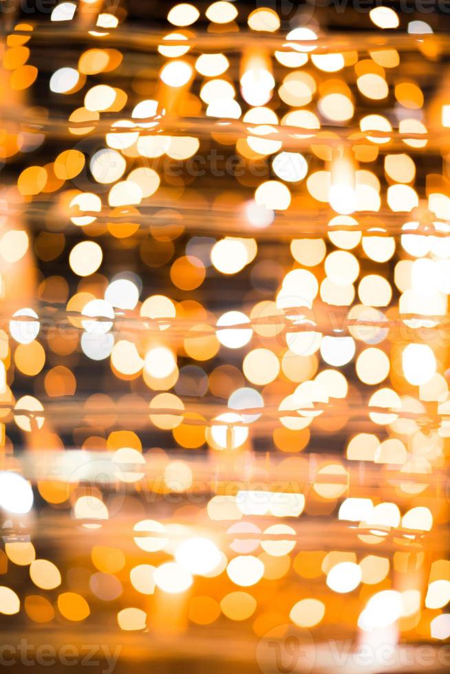 Noël floue lumières jaunes dorées bokeh la nuit photo