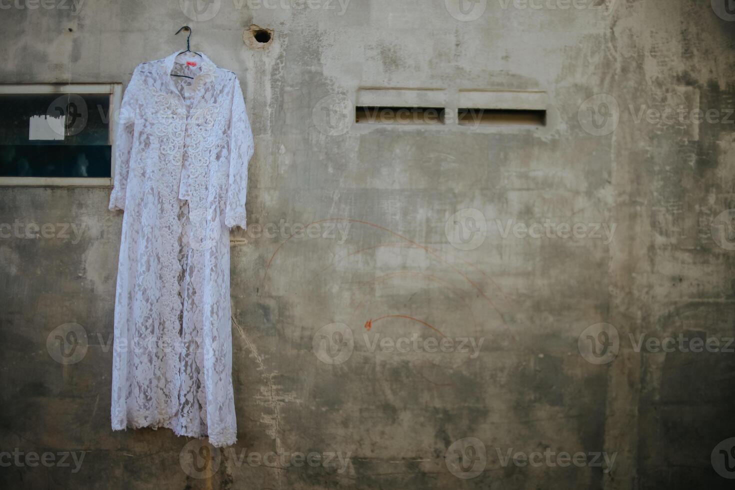le de la mariée robe bloque sur le mur photo