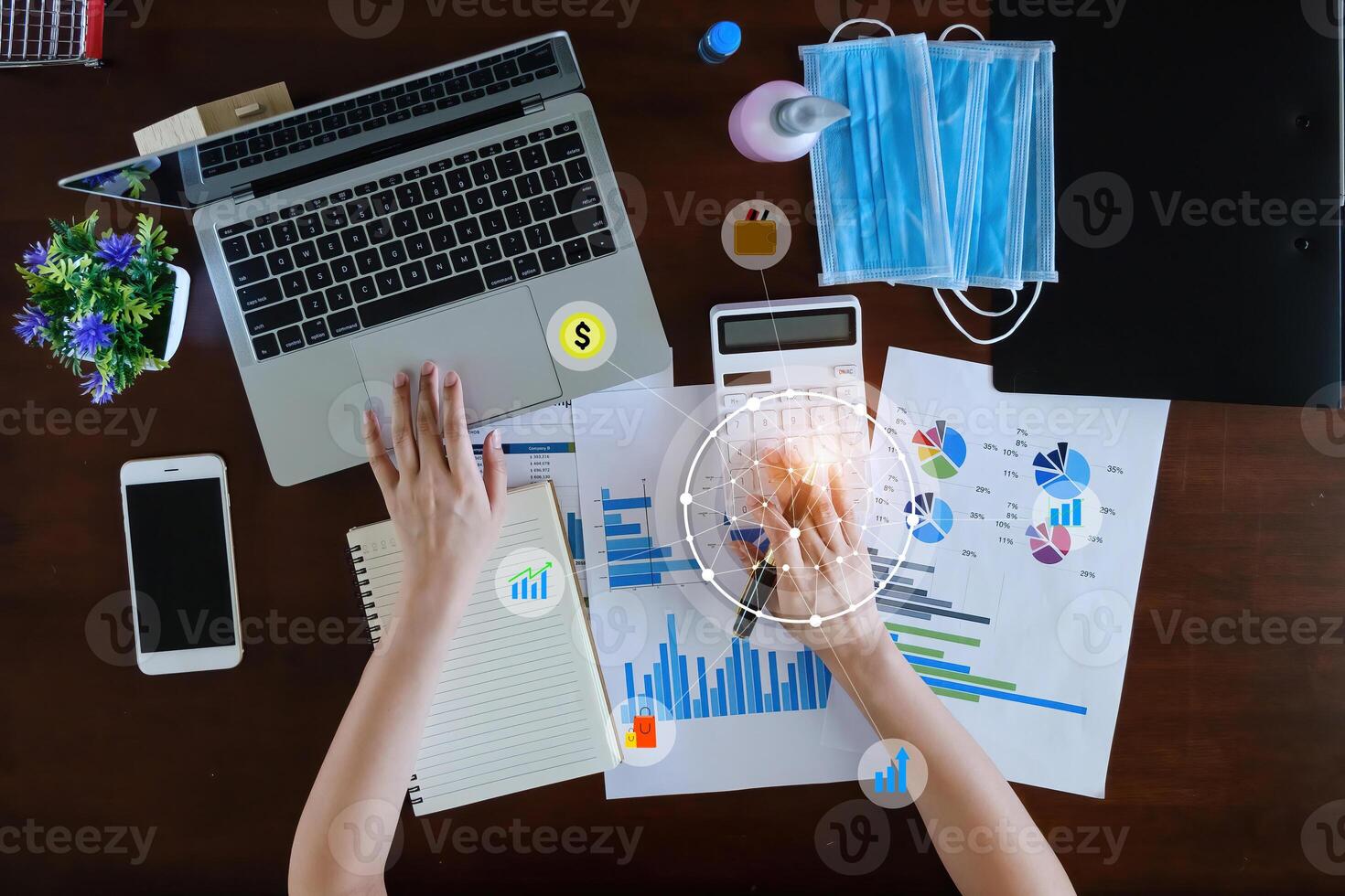 affaires femme main en portant stylo et fabrication Compte sur économie livre avec virtuel icône. argent ou Assurance concept. photo