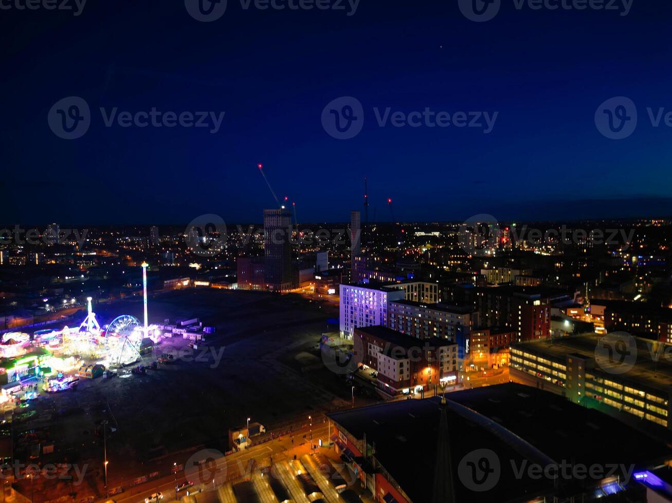 aérien nuit vue de illuminé ville centre bâtiments de Birmingham central ville de Angleterre uni Royaume. Mars 30e, 2024 photo