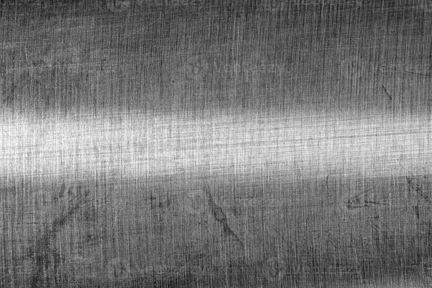 monochrome texture de brillant rayé métal. abstrait Contexte. photo