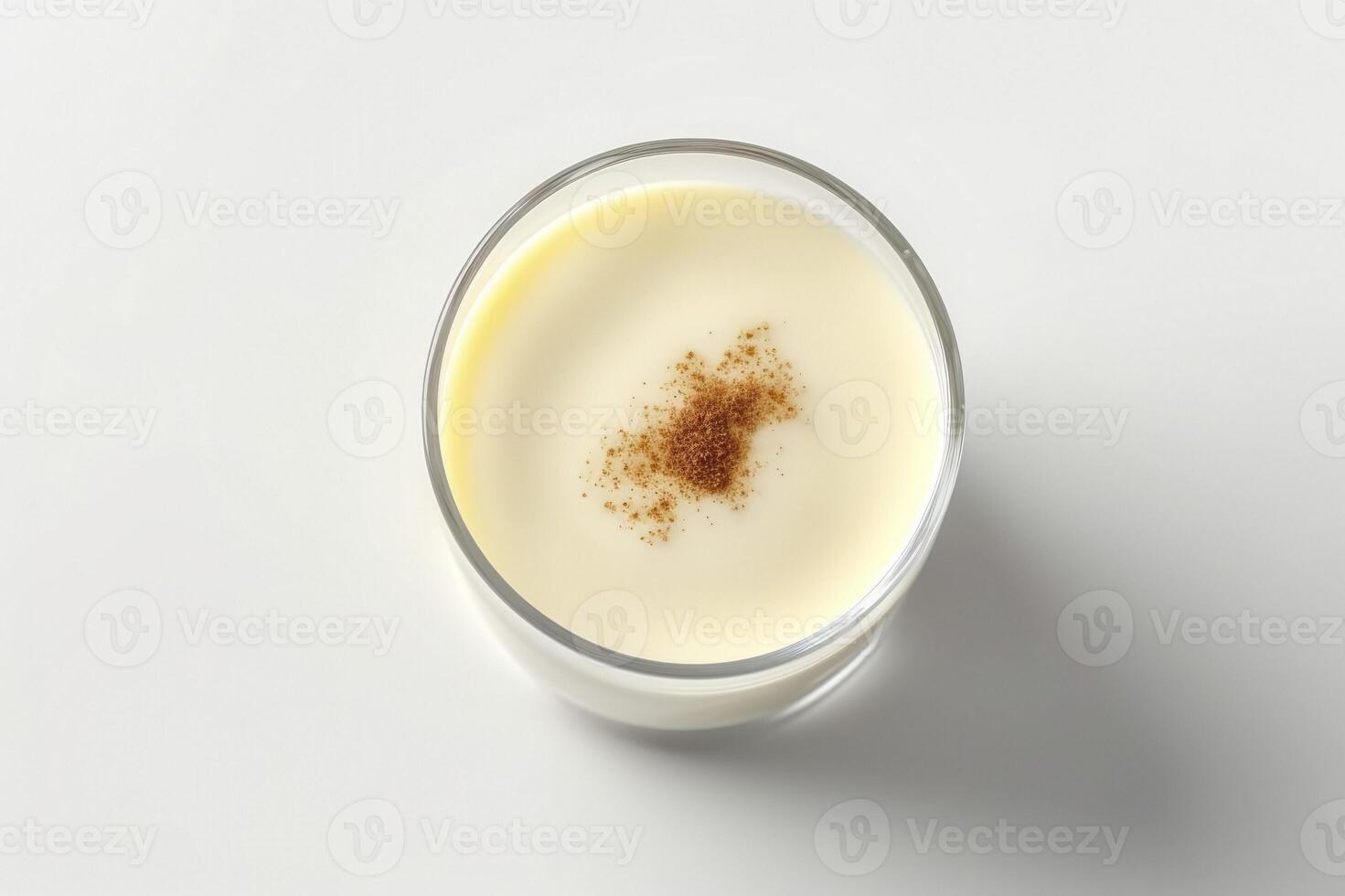 une parfait présentation de crémeux vanille pudding contre une pur blanc toile de fond photo