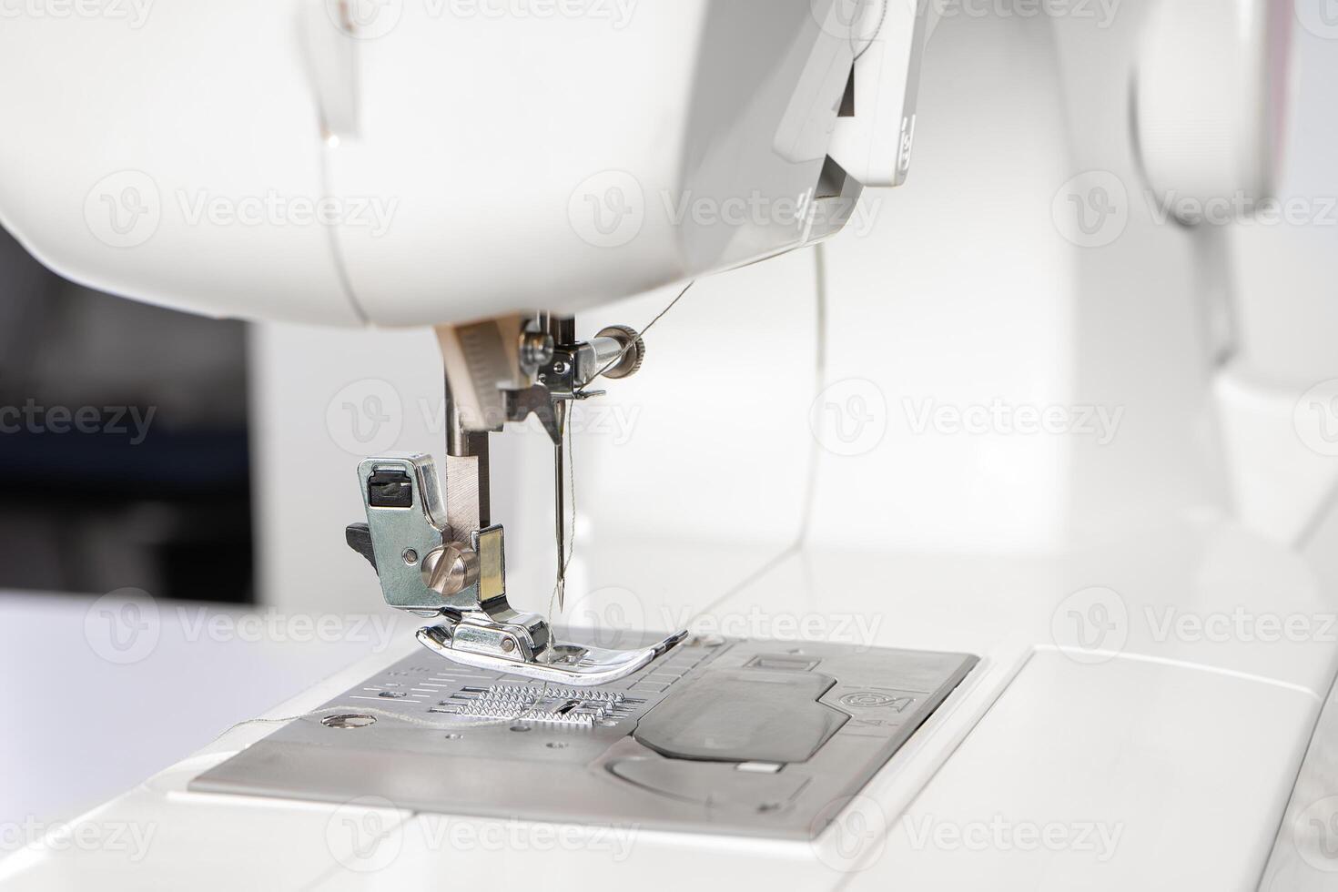 moderne couture machine presseur pied fermer, macro photo