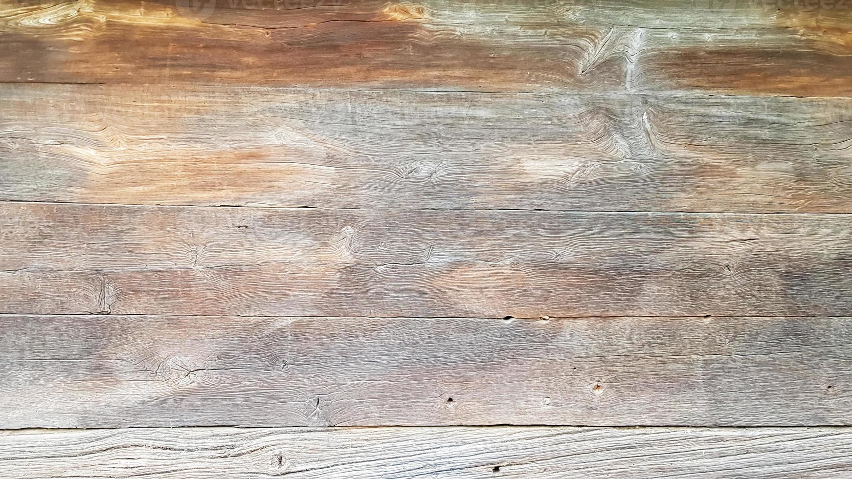 texture du bois comme toile de fond. vue de dessus de la surface de la table pour la prise de vue à plat. modèle vierge abstrait. hangar rustique en bois patiné avec des nœuds et des trous de clous photo
