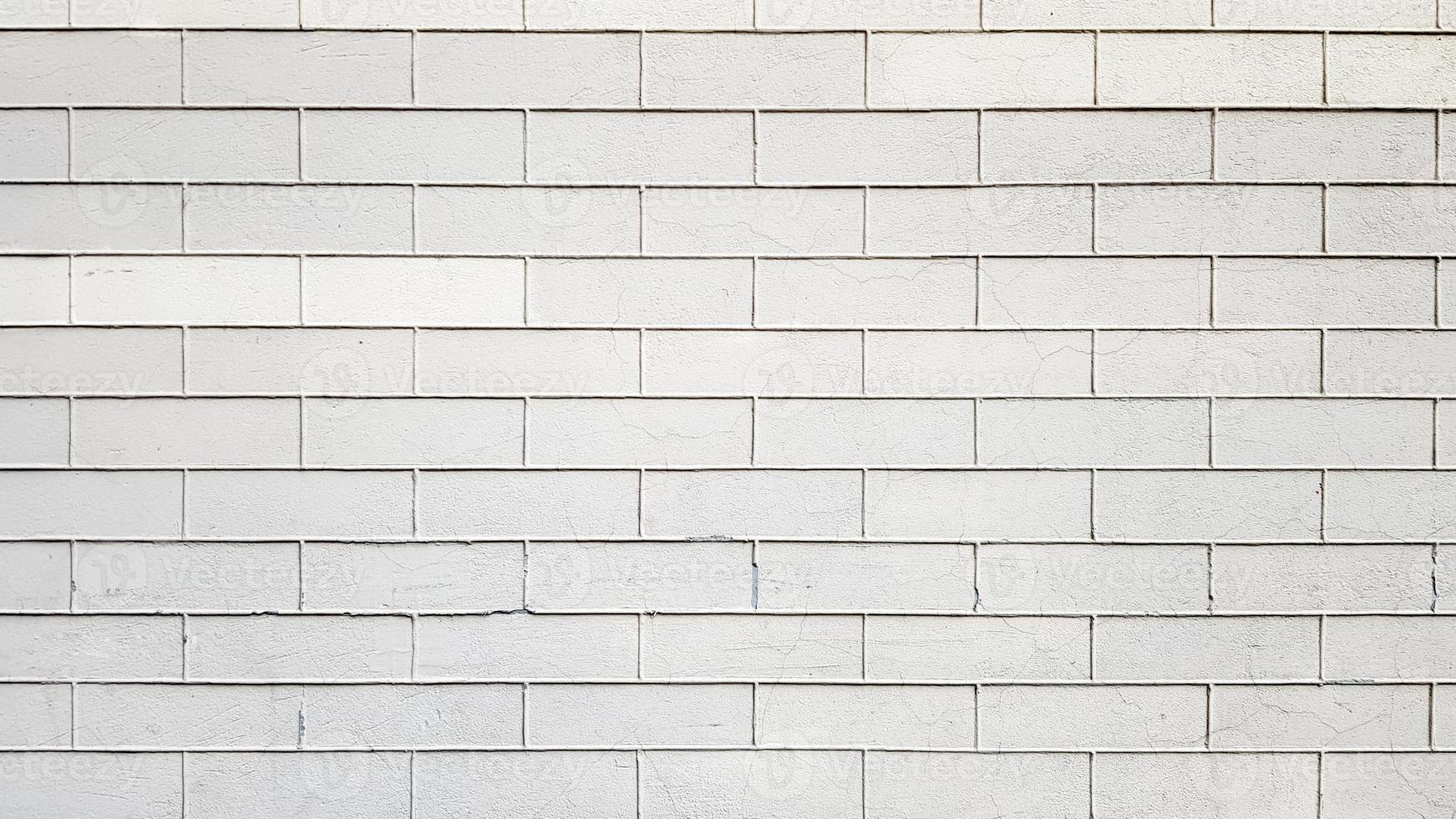 texture de mur de briques blanches moderne pour le fond. abstrait patiné. murs de briques blanches. blocs de pierre. technologies d'architecture horizontale. fond d'écran photo