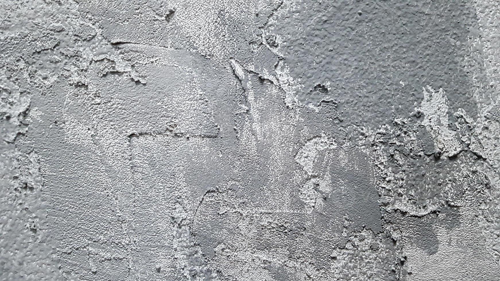 texture de plâtre décoratif gris ou de béton. abstrait pour la conception. effet plâtre décoratif sur le mur. photo