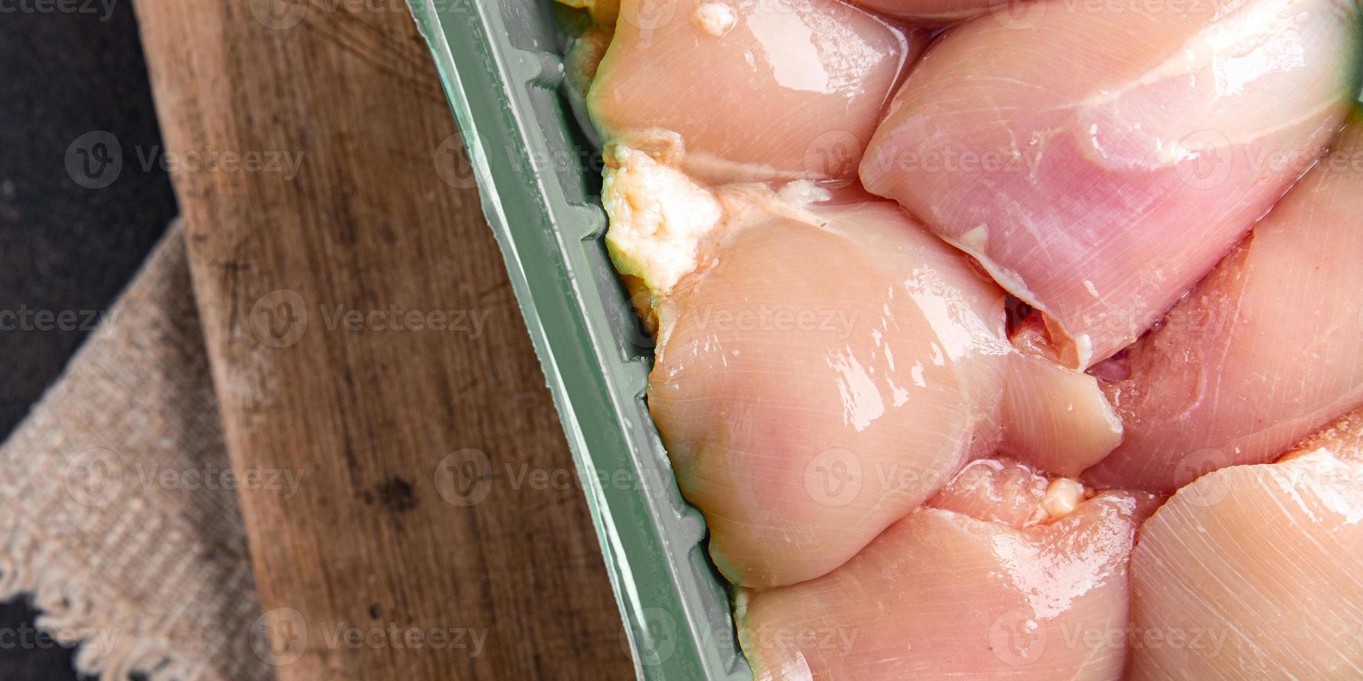 fond de nourriture crue désossée de viande de poulet photo