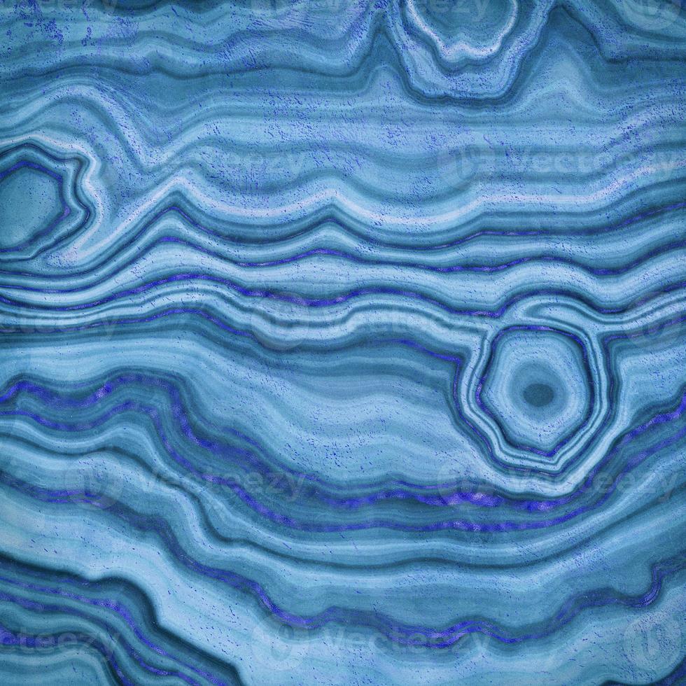 décoration abstraite de texture de marbre agate bleue avec effet marbré fluide ton aqua sur bleu foncé. photo