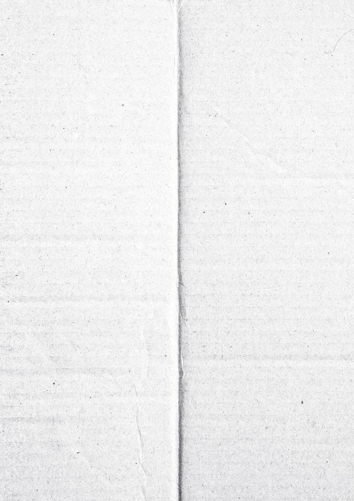 papier plié pour la texture de l'affiche. modèle de papier blanc froissé et froissé pour le fond. papier plein de poussière pour superposition photo