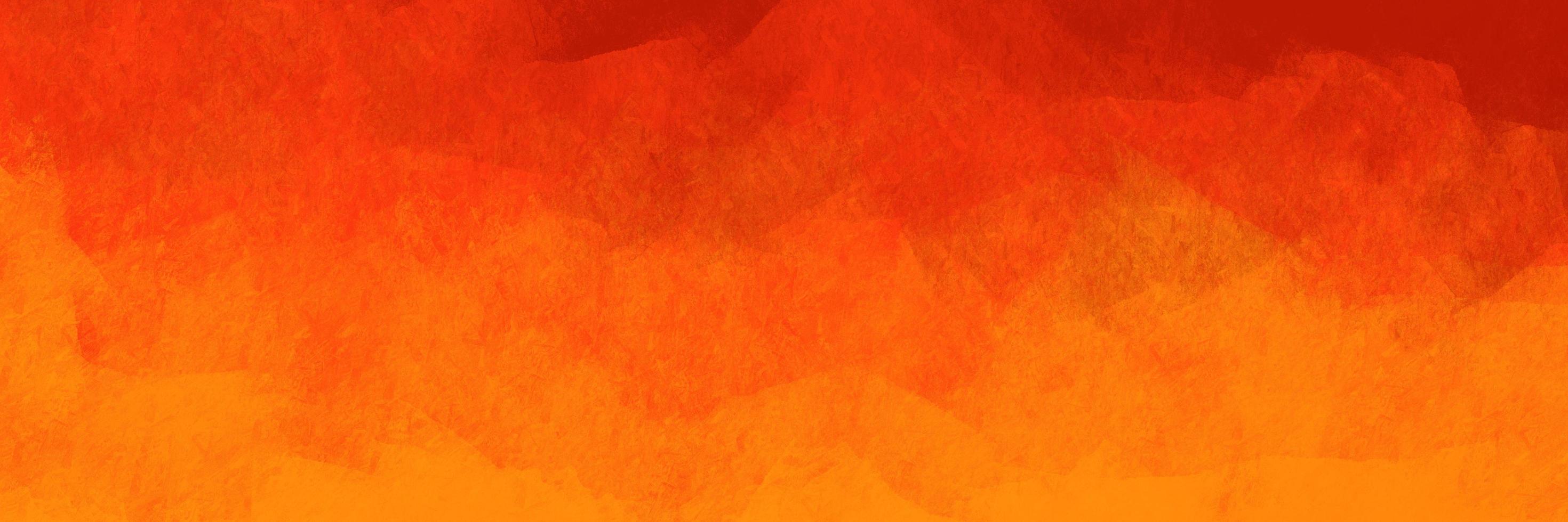 motif de fond abstrait brossé de couleur orangée sur le thème de la flamme. éléments de texture peints en orange pour un design créatif. photo