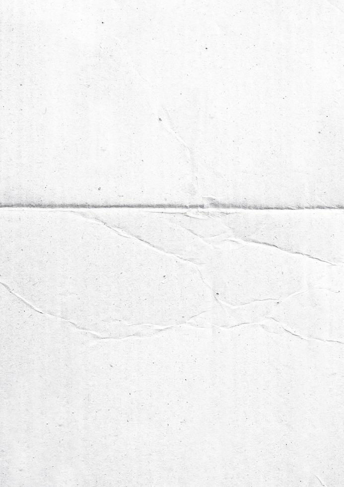 papier plié pour la texture de l'affiche. modèle de papier blanc froissé et froissé pour le fond. papier plein de poussière pour superposition photo