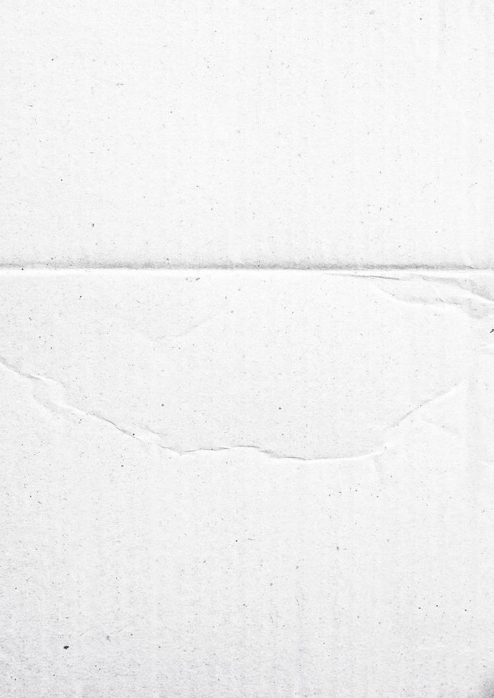 papier plié pour la texture de l'affiche. modèle de papier blanc froissé et froissé pour le fond. papier plein de poussière pour superposition photo
