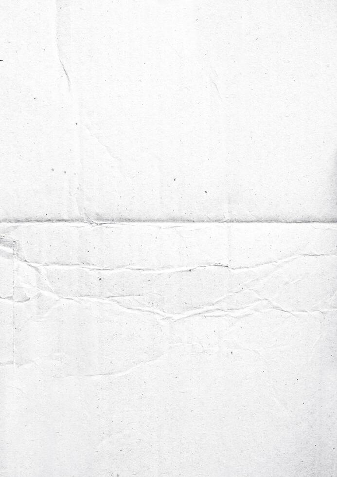 papier plié pour la texture de l'affiche. modèle de papier blanc froissé et froissé pour le fond. papier plein de poussière pour superposition photo