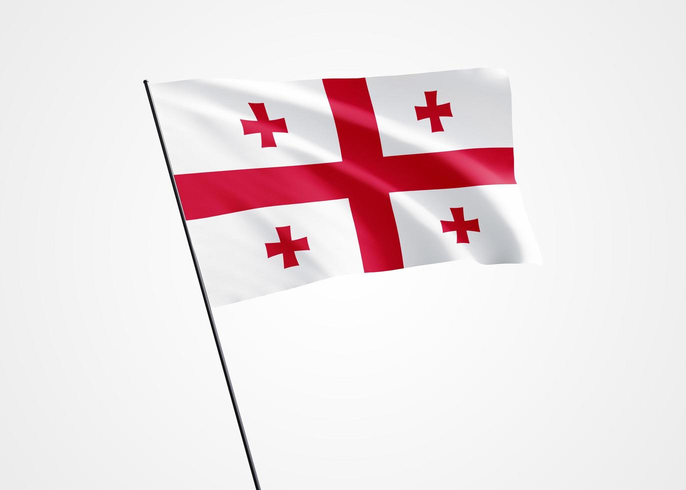 drapeau de la Géorgie volant haut dans le fond blanc isolé. 09 avril fête de l'indépendance de la Géorgie. collection de drapeaux nationaux du monde collection de drapeaux nationaux du monde photo