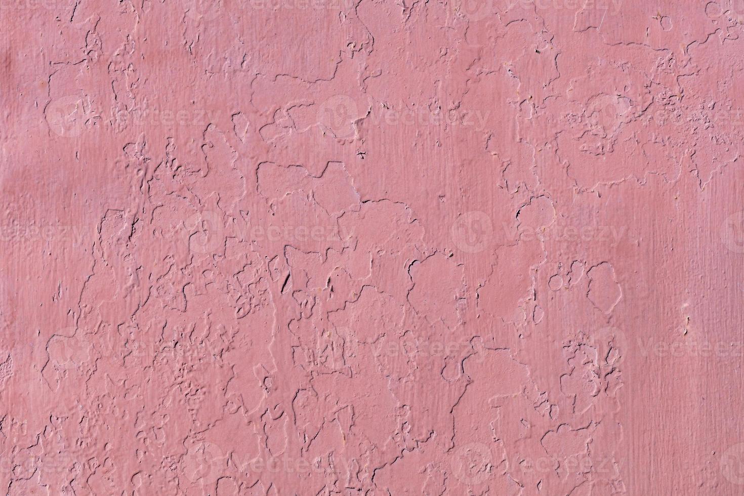 texture et fond du vieux mur, qui est peint avec de la peinture rouge. photo