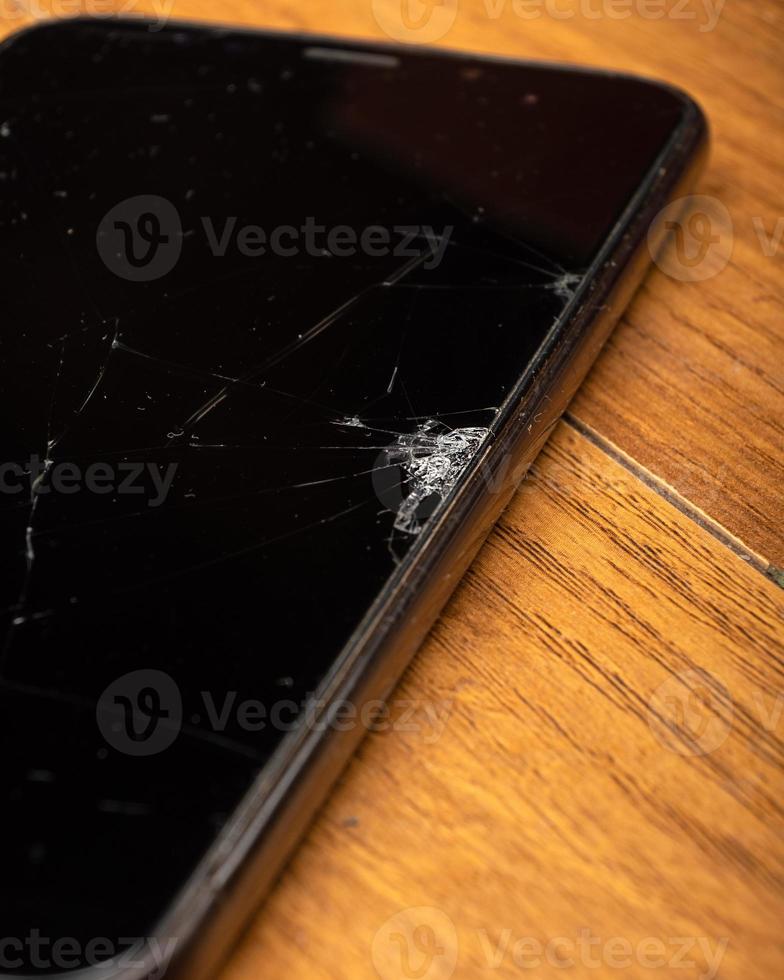 fissures sur l'écran d'un smartphone moderne macro téléphone portable cassé photo