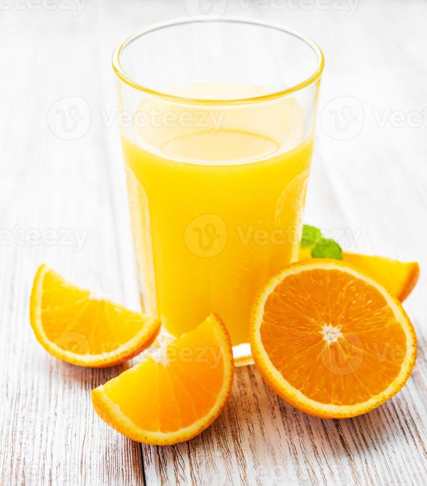 verre de jus et fruits orange photo