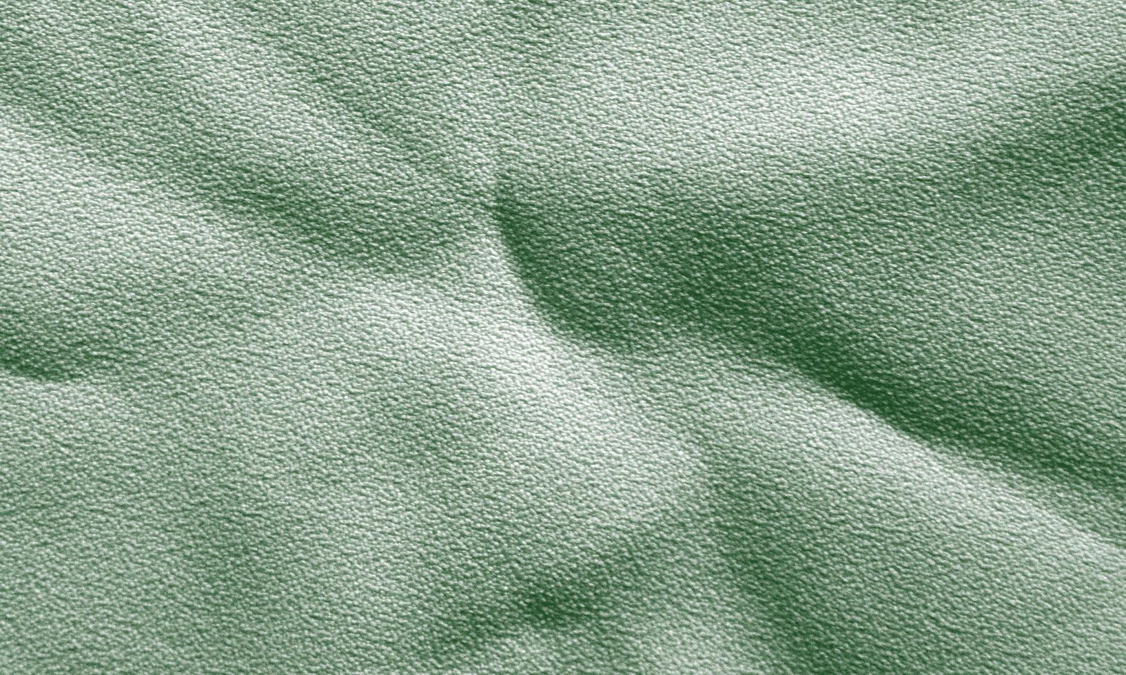 texture de tissu froissé vert foncé pour le fond photo