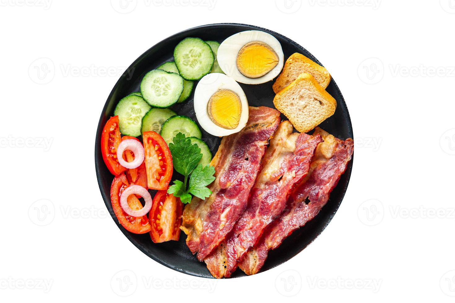 petit-déjeuner bacon, œufs, légumes repas sains collation sur l'espace de copie de la table photo