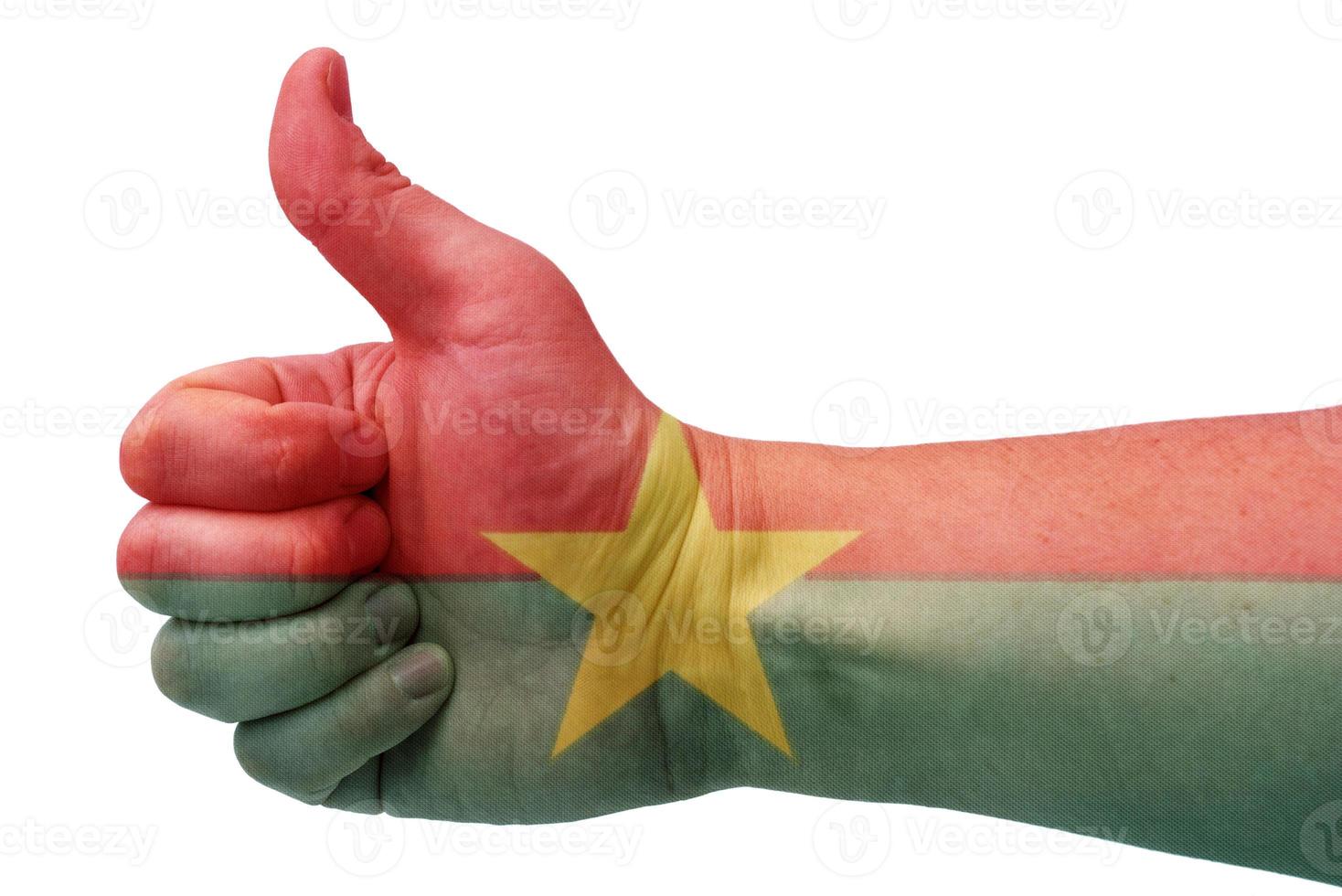 le concept de burkina faso-main lève le pouce avec le drapeau du burkina faso. photo