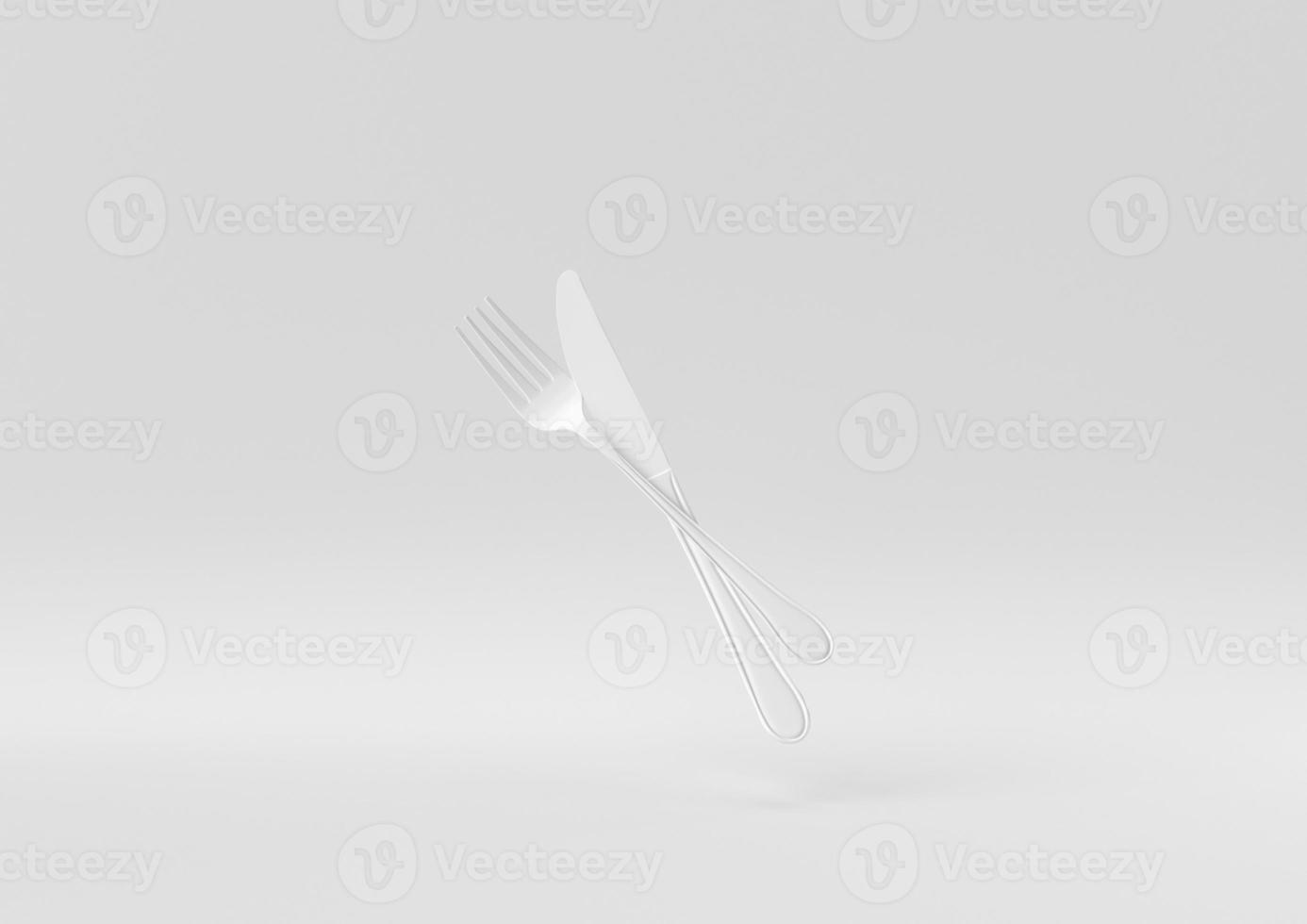 fourchette et couteau blancs flottant sur fond blanc. idée de concept minimal créatif. monochrome. rendu 3D. photo