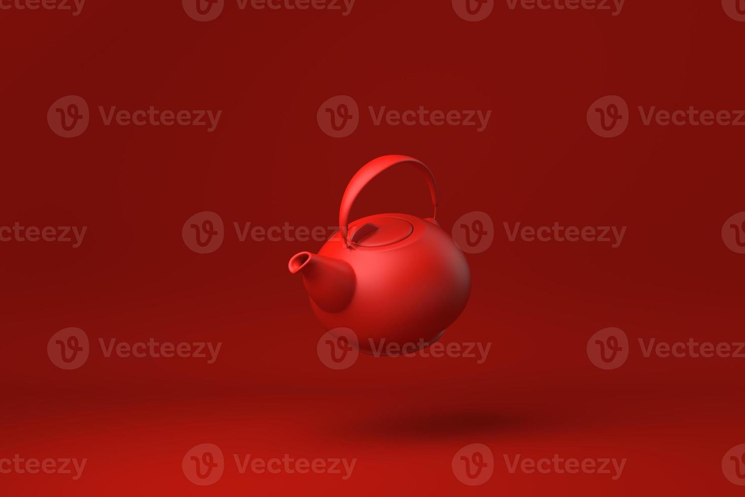 théière rouge flottant sur fond rouge. idée de concept minimal créatif. monochrome. rendu 3D. photo