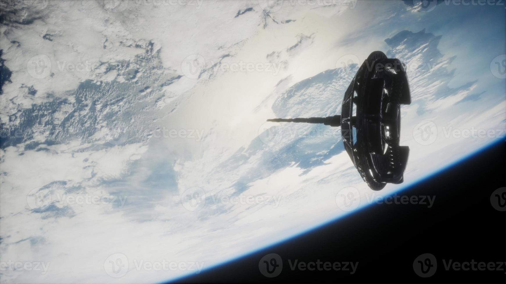 satellite spatial futuriste en orbite autour de la terre photo